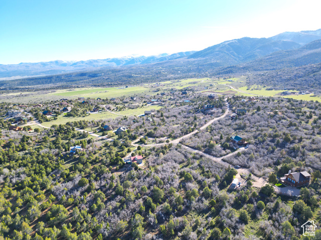 14050 Oak Rdg Circle, Unit 144 Mount Pleasant, UT 84647 - Photo 10 of 28 Aerial view of property and surrounding area featuring a mountainous background