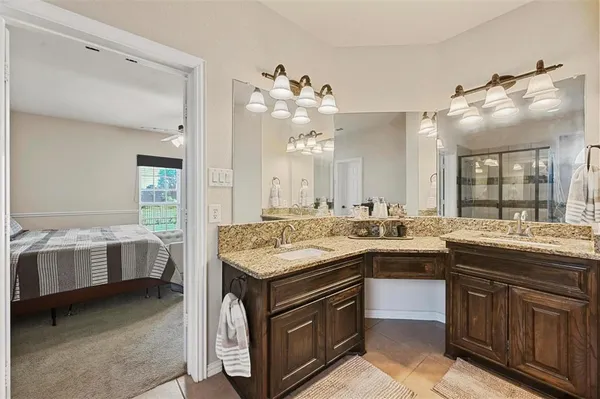 a kitchen with a sink and stove