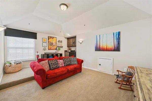 a living room with furniture workspace and a window