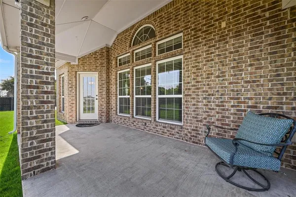 a view of an chairs with a table and chair