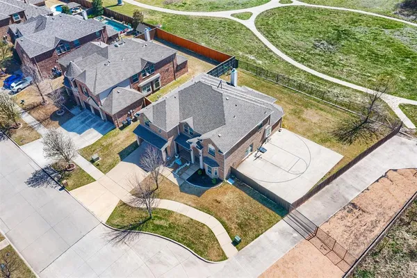 an aerial view of a house having swimming pool