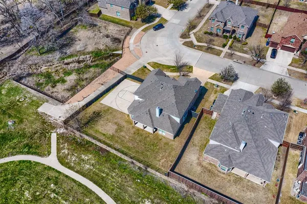 an aerial view of residential house with outdoor space