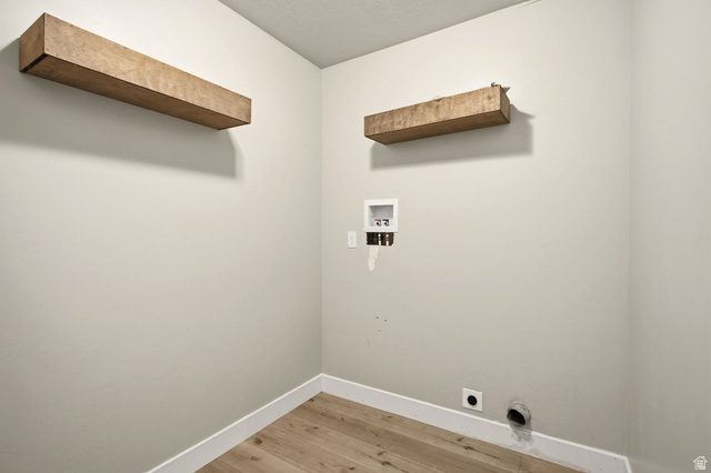 664 South Saddle Road Grantsville, UT 84029 - Photo 18 of 39 Main floor laundry room located right by the bedrooms.