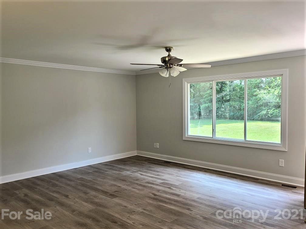 1 Old Farm Road Salisbury, NC 28147 - Photo 2 of 4 wooden floor in an empty room with a window