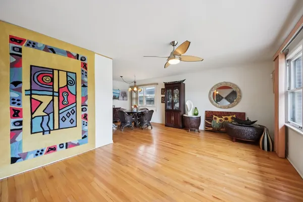 a view of living room with furniture and a window