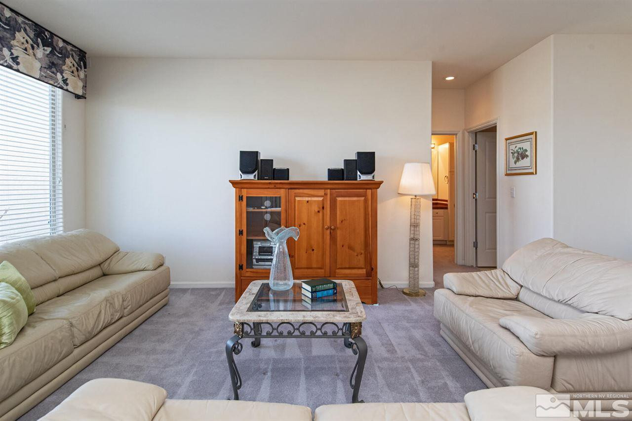 3345 Skyline Boulevard Reno, NV 89509 - Photo 18 of 38 a living room with furniture and a window