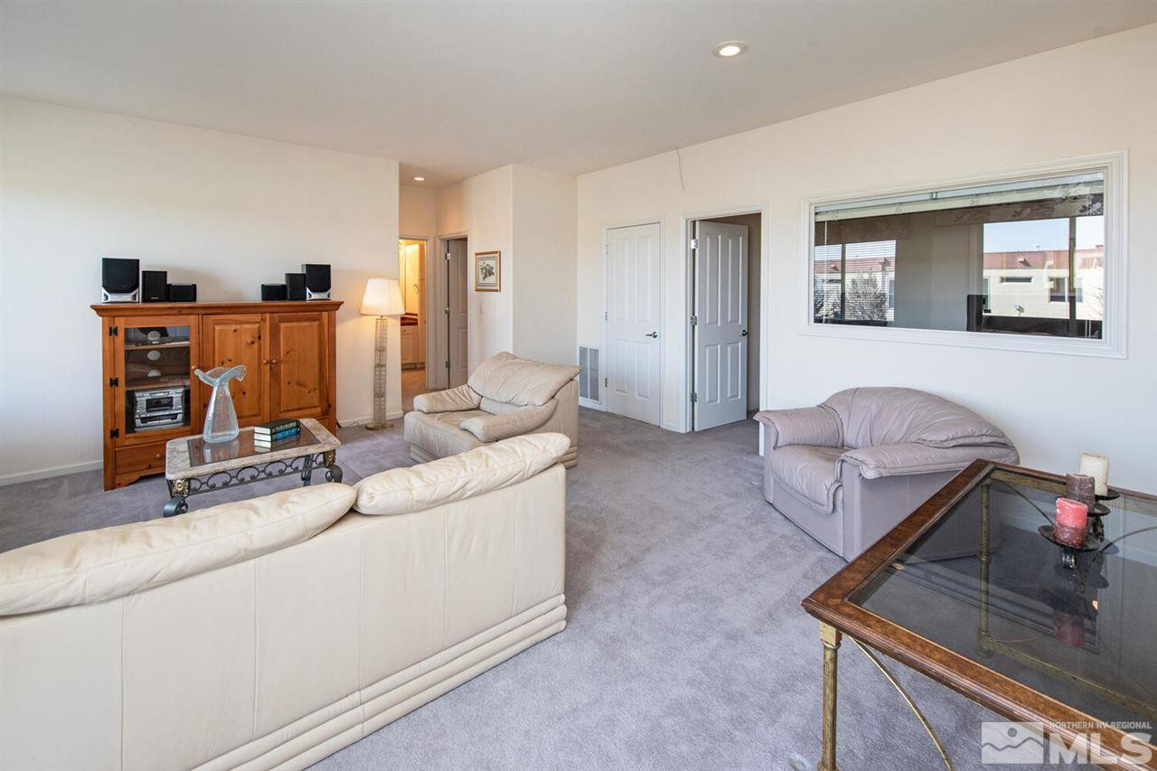 3345 Skyline Boulevard Reno, NV 89509 - Photo 20 of 38 a living room with furniture and a couch