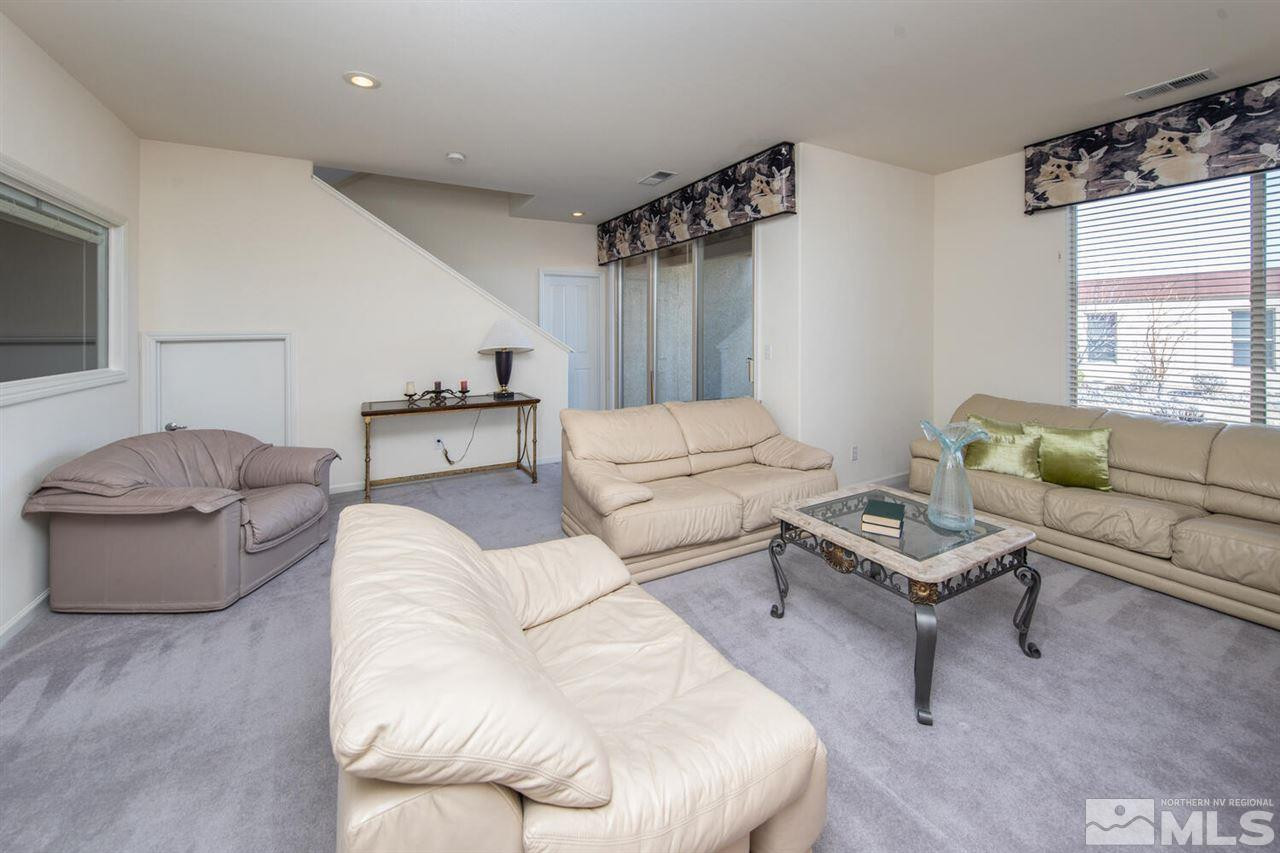 3345 Skyline Boulevard Reno, NV 89509 - Photo 21 of 38 a living room with furniture and a window