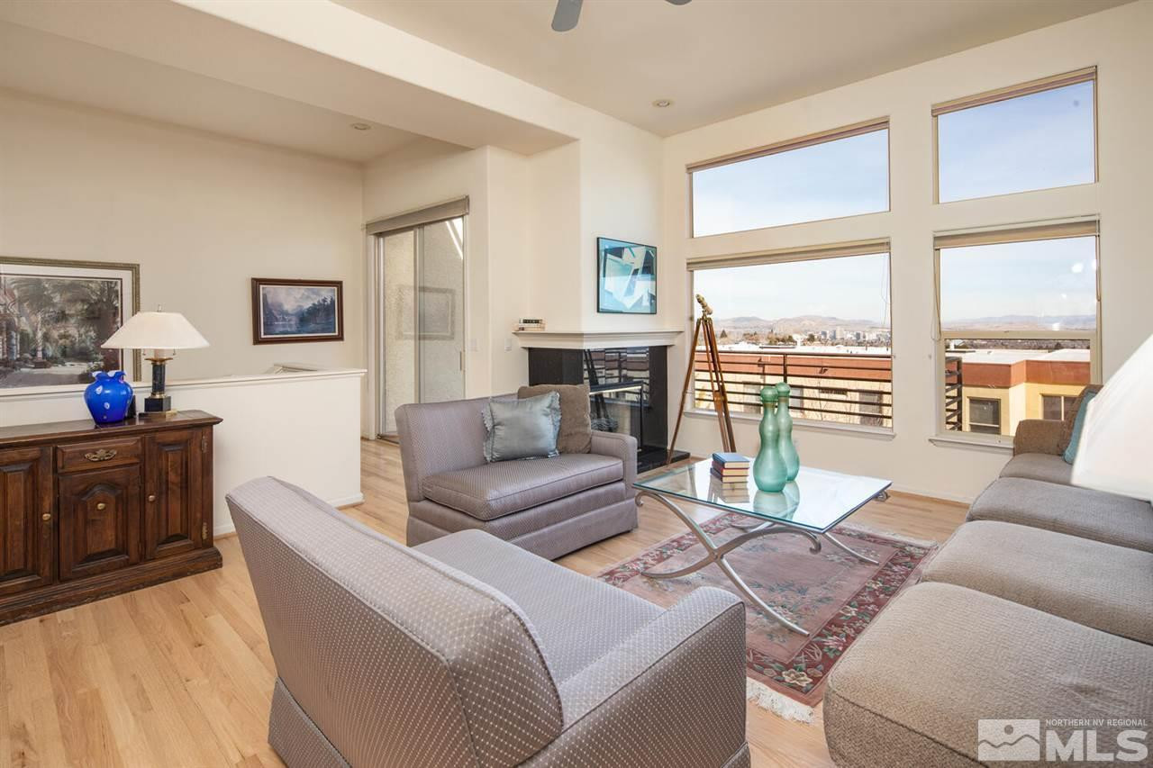 3345 Skyline Boulevard Reno, NV 89509 - Photo 3 of 38 a living room with furniture and a large window