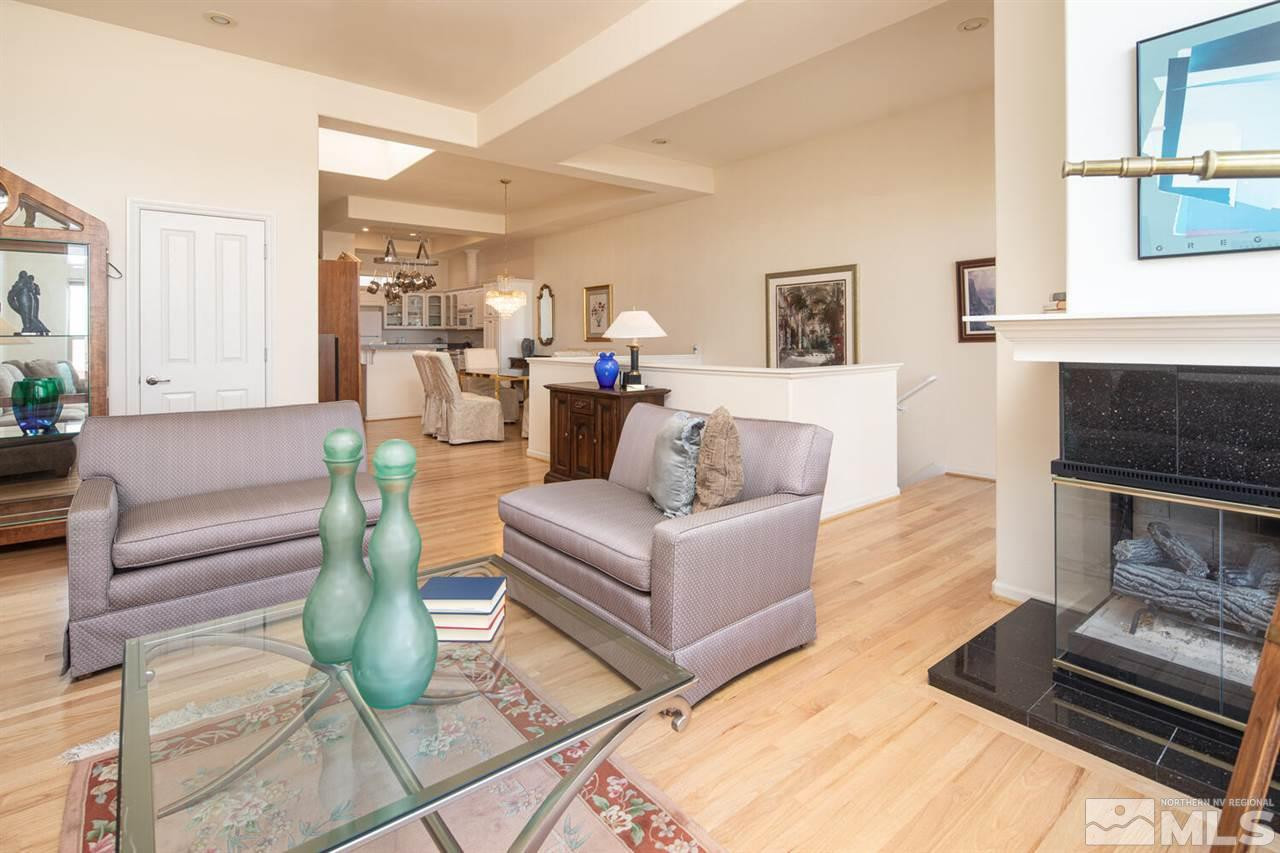 3345 Skyline Boulevard Reno, NV 89509 - Photo 4 of 38 a living room with furniture and a fireplace