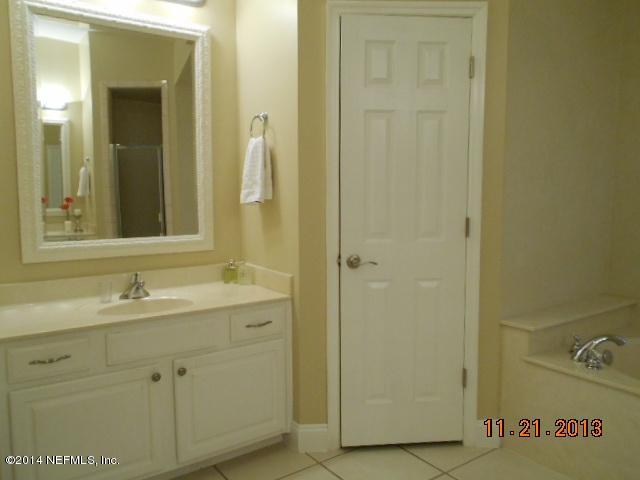 1116 Regis Road Jacksonville, FL 32218 - Photo 11 of 49 11 left vanity & water closet