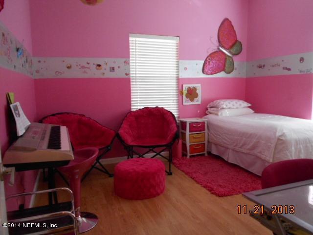 1116 Regis Road Jacksonville, FL 32218 - Photo 18 of 49 18 bedroom 3 with walk-in closet