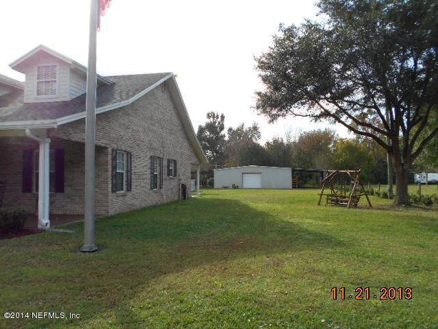 1116 Regis Road Jacksonville, FL 32218 - Photo 20 of 49 20 side view