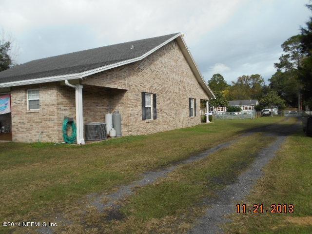 1116 Regis Road Jacksonville, FL 32218 - Photo 25 of 49 25 side view and second driveway