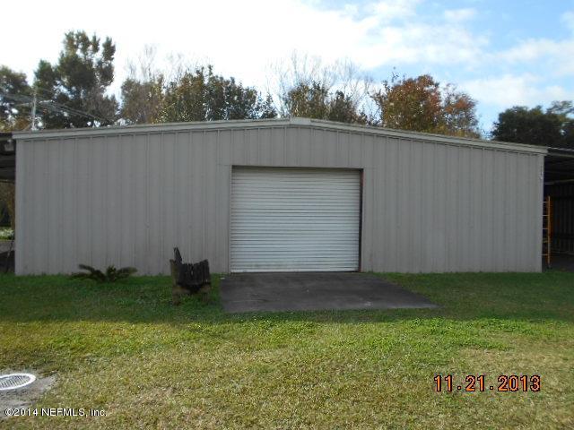1116 Regis Road Jacksonville, FL 32218 - Photo 29 of 49 29 front of garage