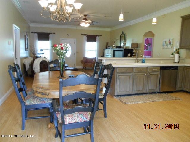 1116 Regis Road Jacksonville, FL 32218 - Photo 6 of 49 06 dining room thru to the family room