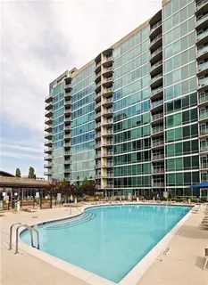 a view of a balcony with a floor to ceiling windows