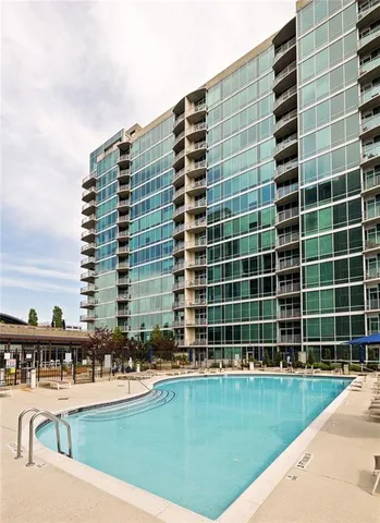 a view of a balcony with a floor to ceiling windows