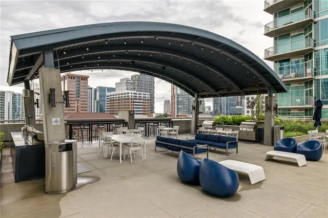 a view of a tall building from a balcony
