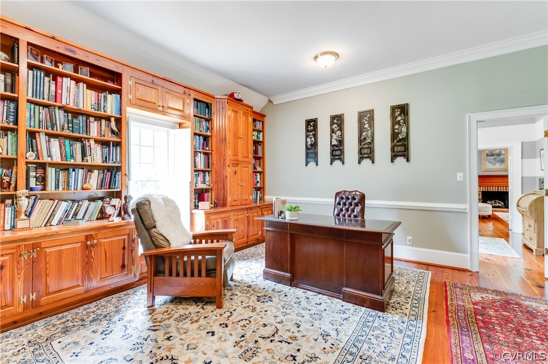 1290 Johns Road Carson, VA 23830 - Photo 17 of 48 a living room with furniture and a book shelf