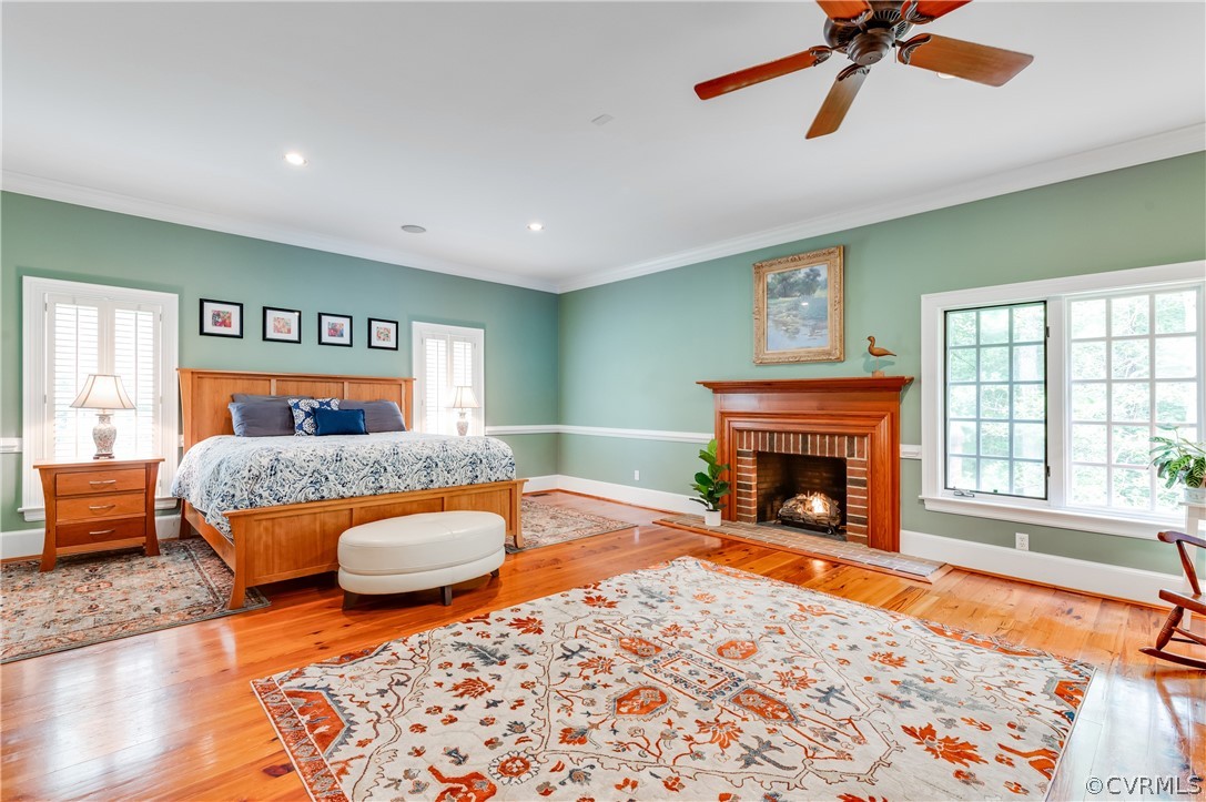 1290 Johns Road Carson, VA 23830 - Photo 19 of 48 a living room with furniture a fireplace and wooden floor