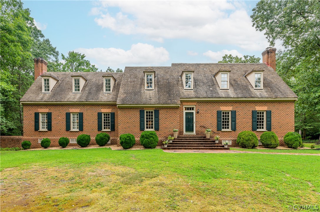 1290 Johns Road Carson, VA 23830 - Photo 2 of 48 a front view of a house with garden
