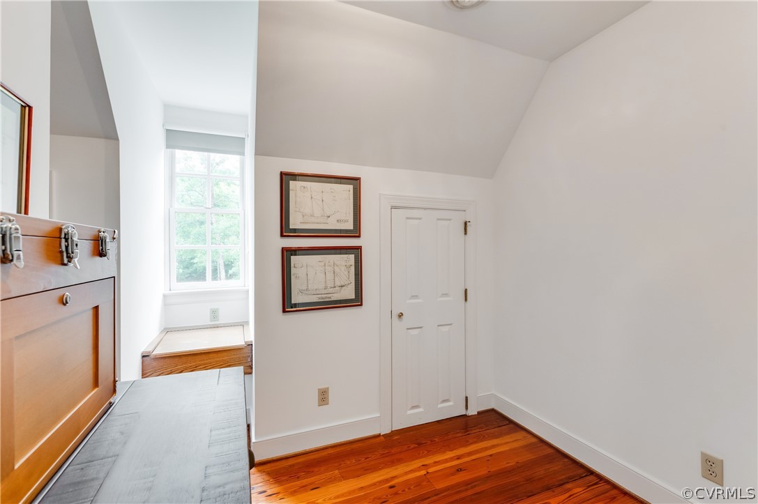 1290 Johns Road Carson, VA 23830 - Photo 25 of 48 a view of a kitchen with wooden floor and a window