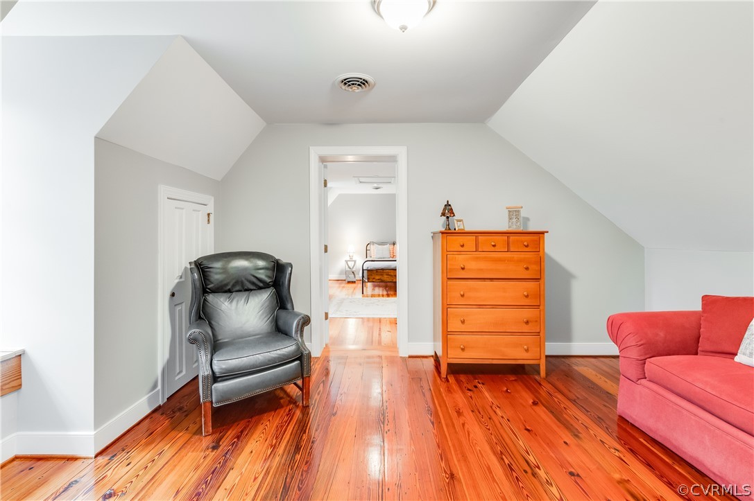 1290 Johns Road Carson, VA 23830 - Photo 29 of 48 a living room with furniture and a wooden floor