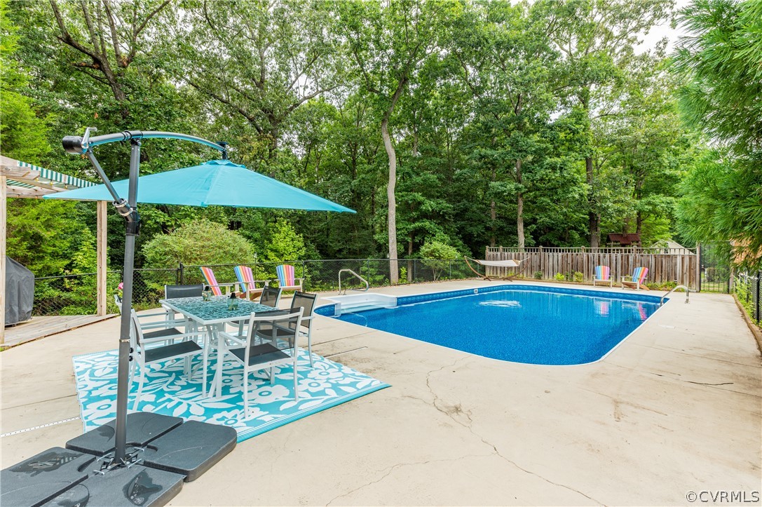 1290 Johns Road Carson, VA 23830 - Photo 38 of 48 a view of a swimming pool with a patio