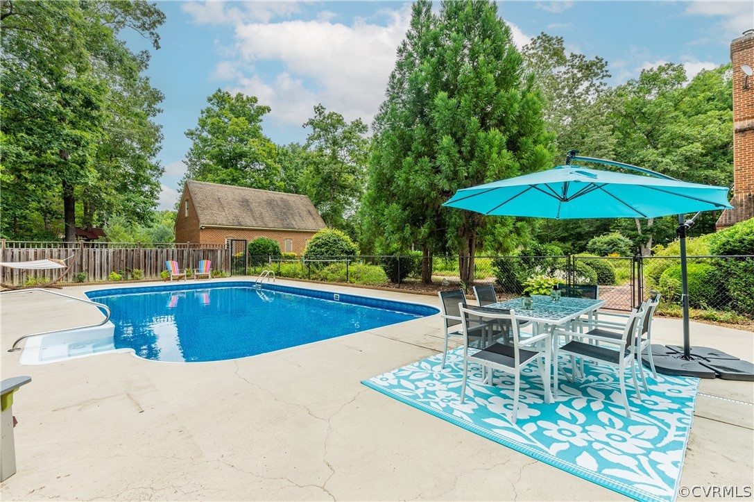 1290 Johns Road Carson, VA 23830 - Photo 39 of 48 a view of a chairs and table in the patio