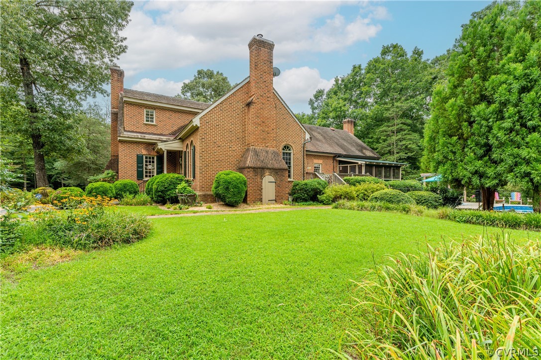 1290 Johns Road Carson, VA 23830 - Photo 44 of 48 a front view of a house with a yard