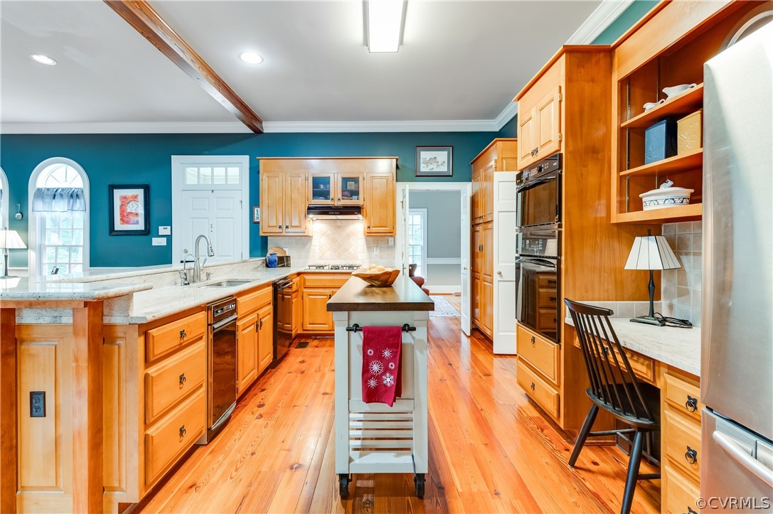 1290 Johns Road Carson, VA 23830 - Photo 9 of 48 a kitchen with stainless steel appliances granite countertop a sink and cabinets