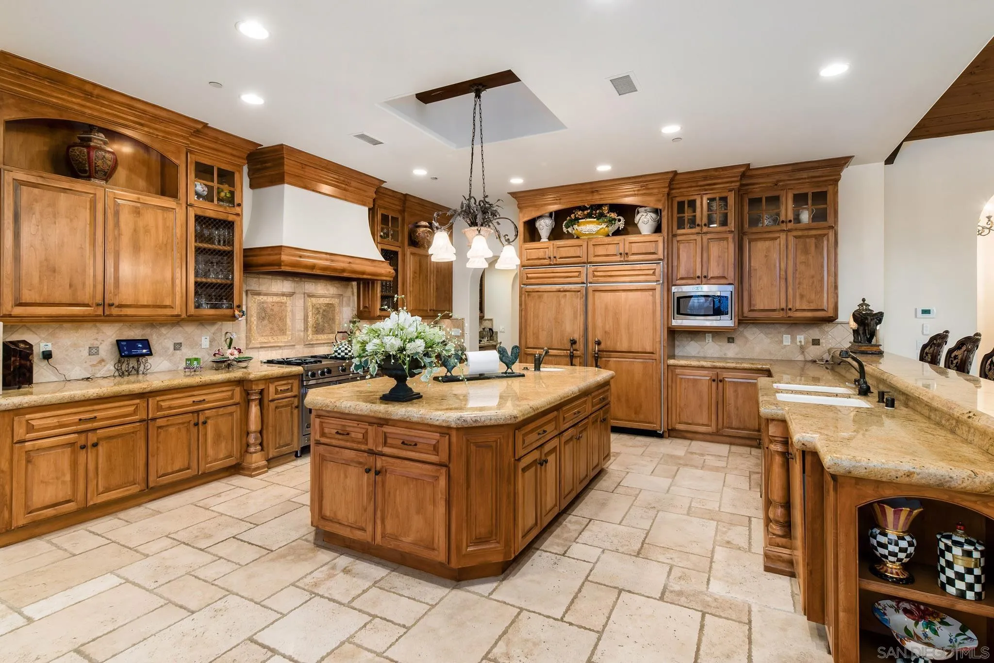 14160 Augusta Court Poway, CA 92064 - Photo 13 of 26 a kitchen with stainless steel appliances granite countertop a stove a sink and a refrigerator