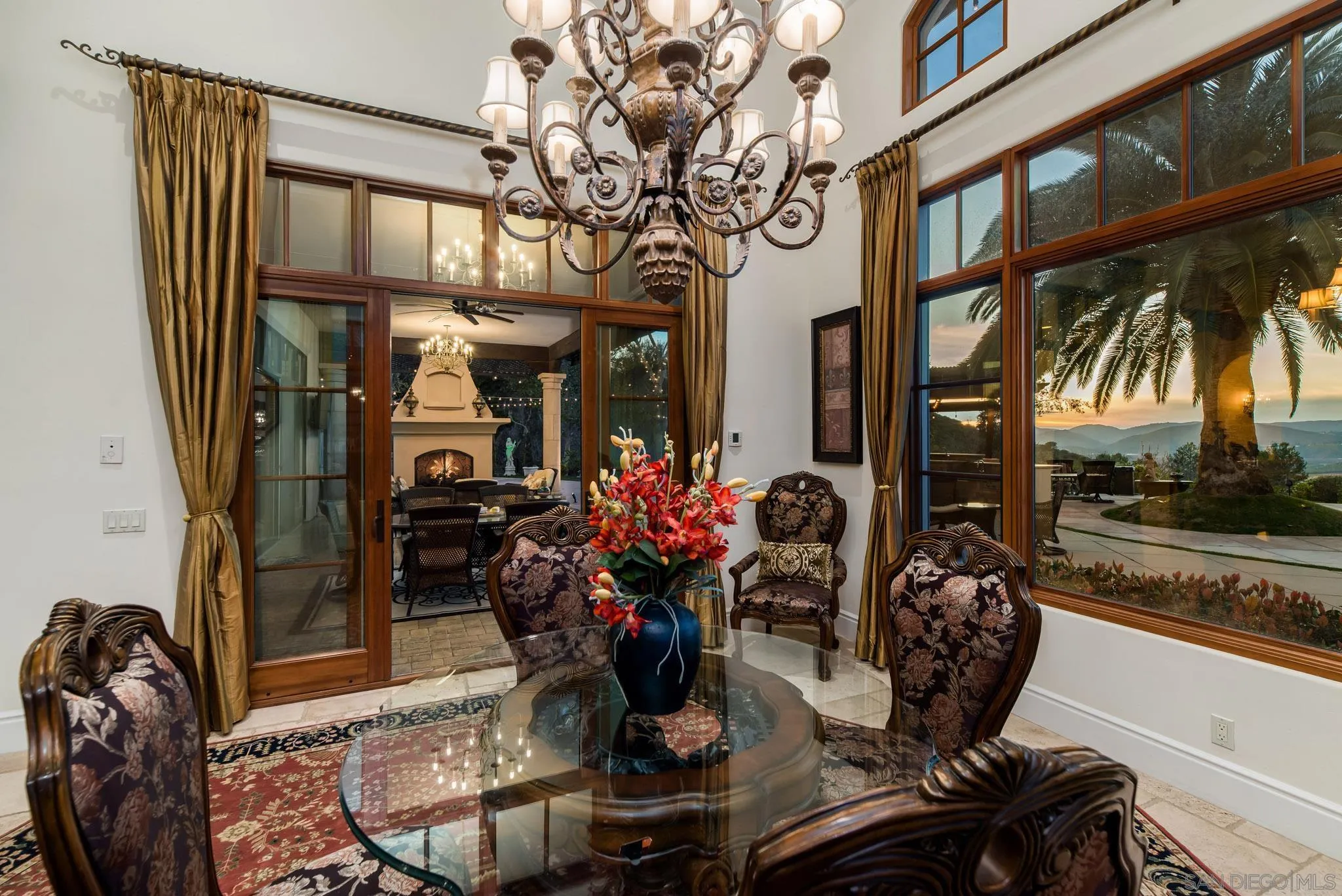 14160 Augusta Court Poway, CA 92064 - Photo 15 of 26 a view of a dining room with furniture and a floor to ceiling window
