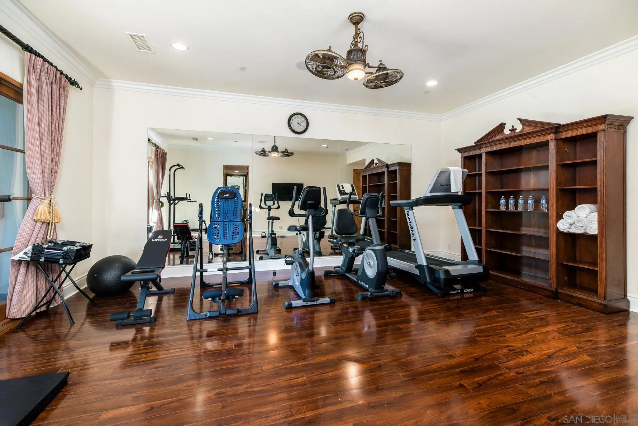 14160 Augusta Court Poway, CA 92064 - Photo 16 of 26 a view of a room with lots of wooden furniture and windows