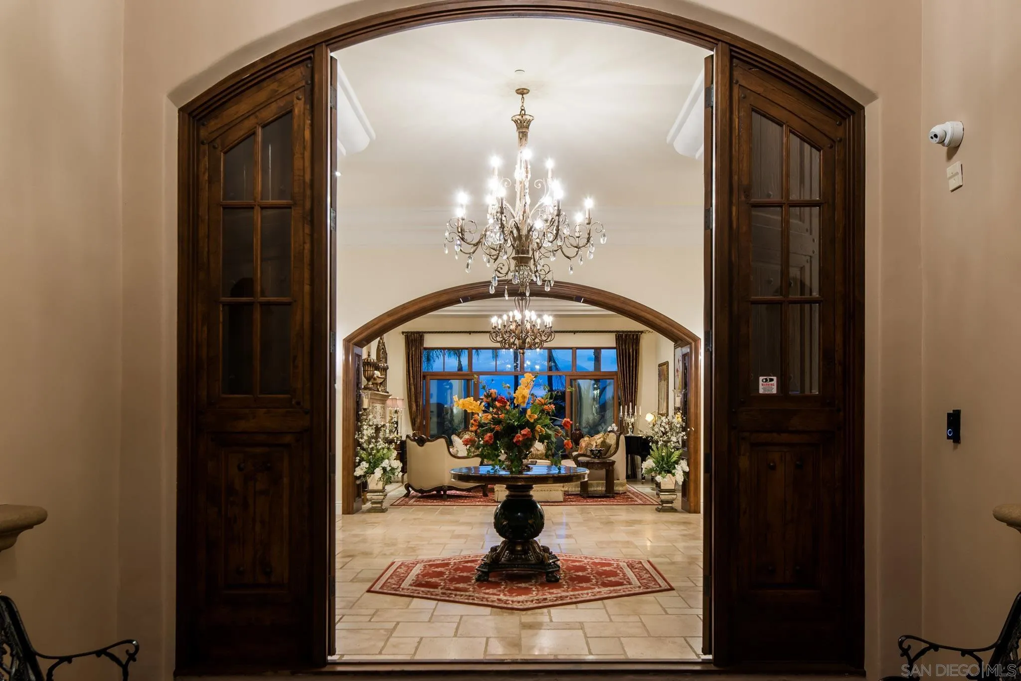 14160 Augusta Court Poway, CA 92064 - Photo 5 of 26 a living room with fireplace furniture and a chandelier