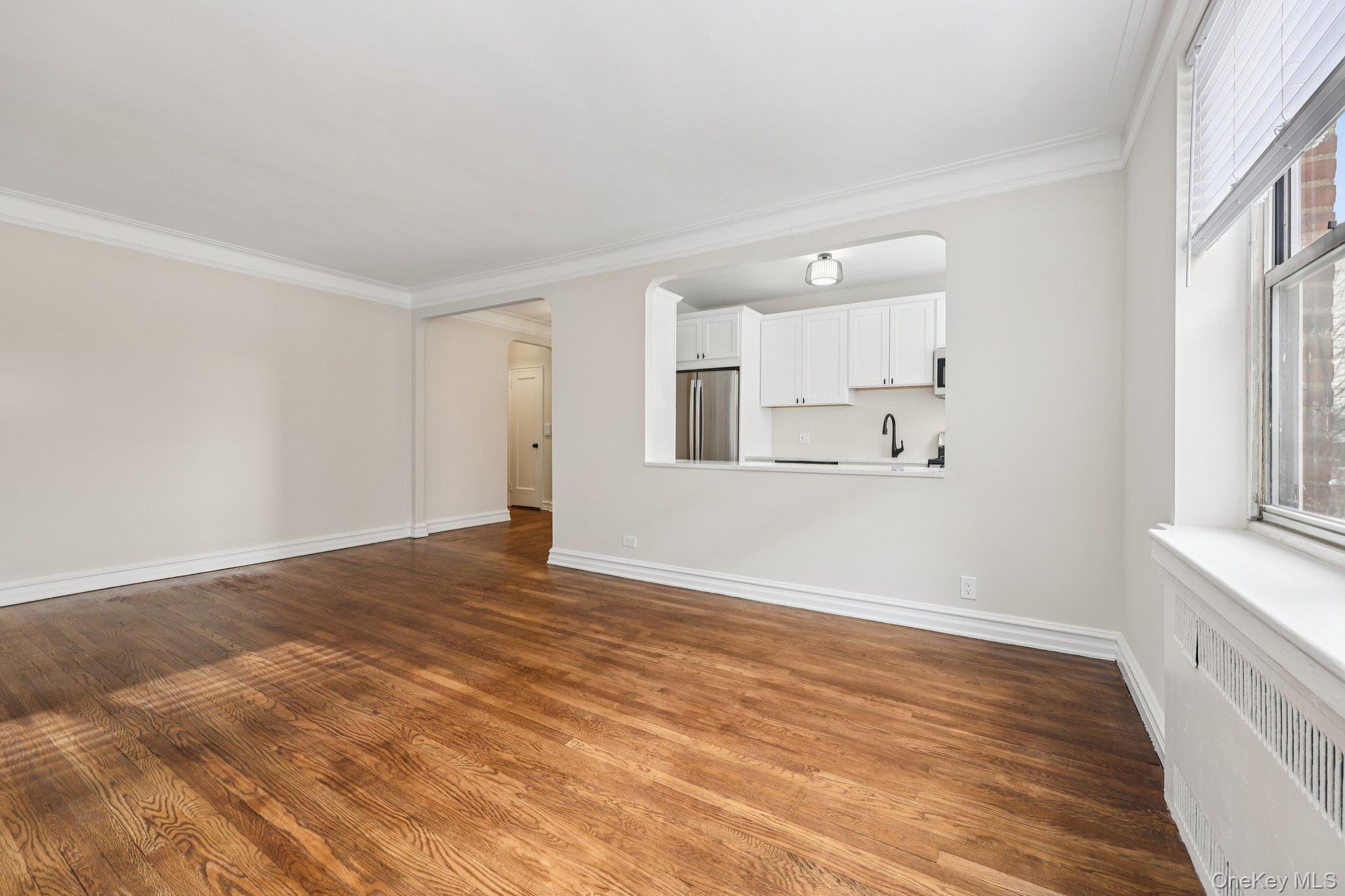 1 Bronxville Road, Unit 3S Bronxville, NY 10708 - Photo 26 of 27 with large opening into kitchen, creating open floor plan