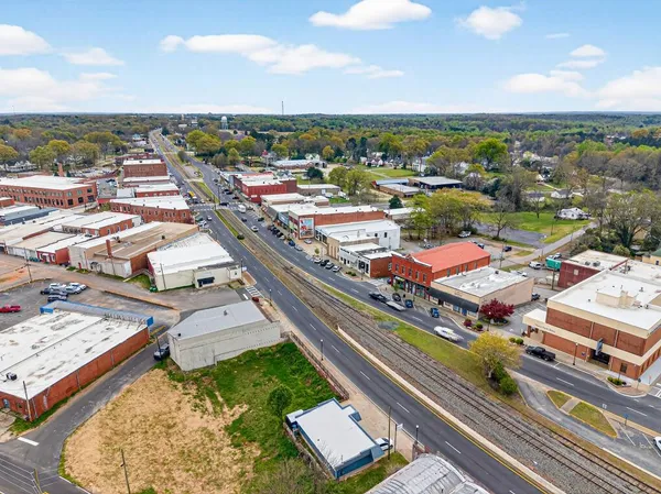 a sign that is on the brick wall