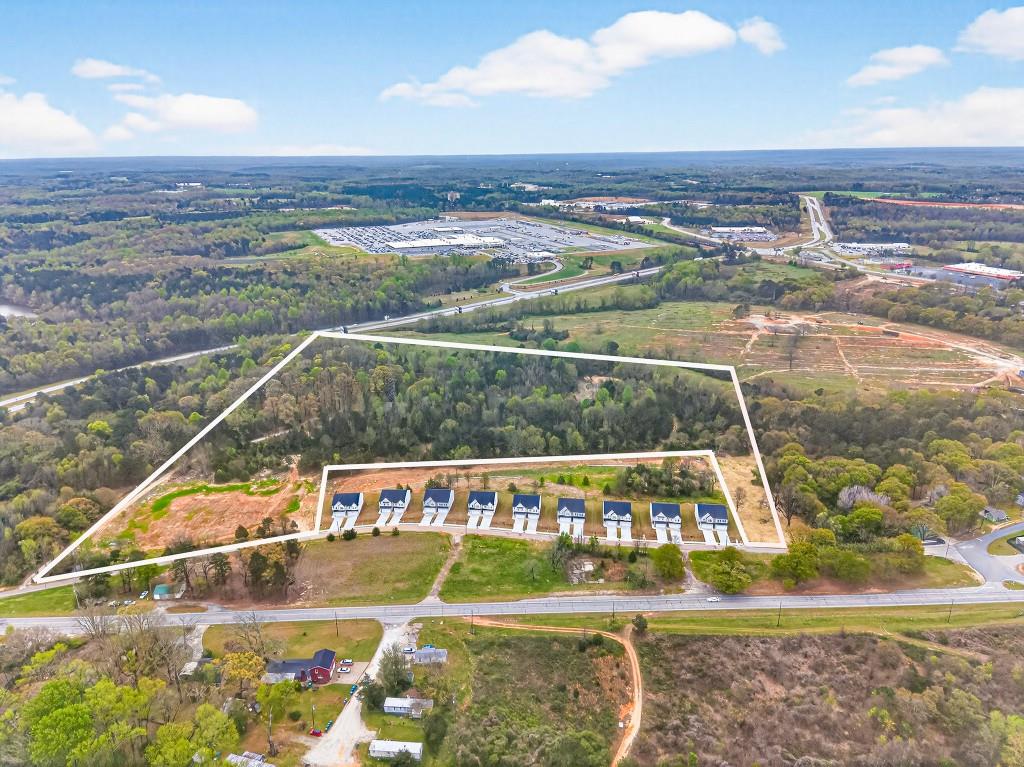 530 Madison Street Commerce, GA 30529 - Photo 2 of 27 a view of a swimming pool with an ocean view