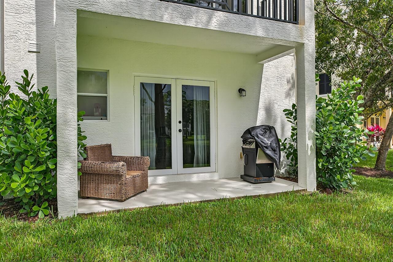 1685 42nd Square, Unit 101 Vero Beach, FL 32960 - Photo 23 of 37 a view of a entryway front of house