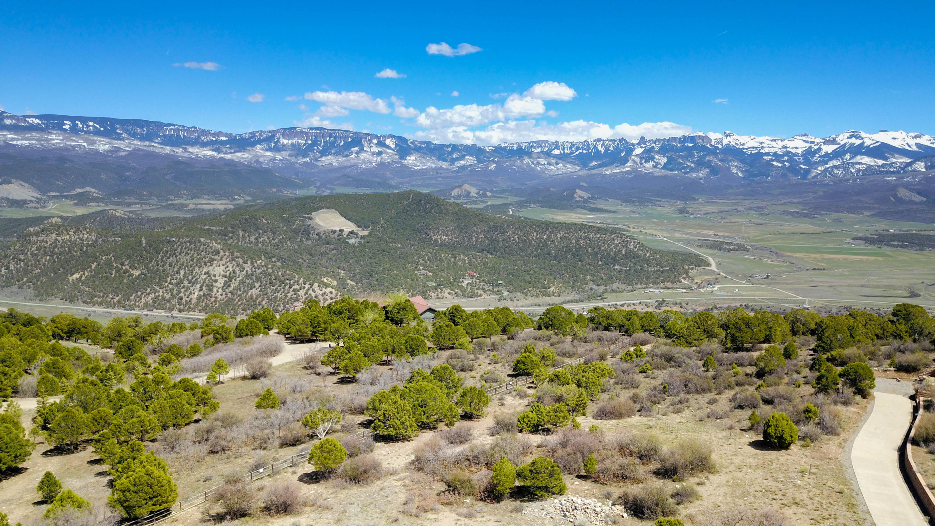 802 Pine Drive Ridgway, CO 81432 - Photo 2 of 10 a view of a lake with a mountain