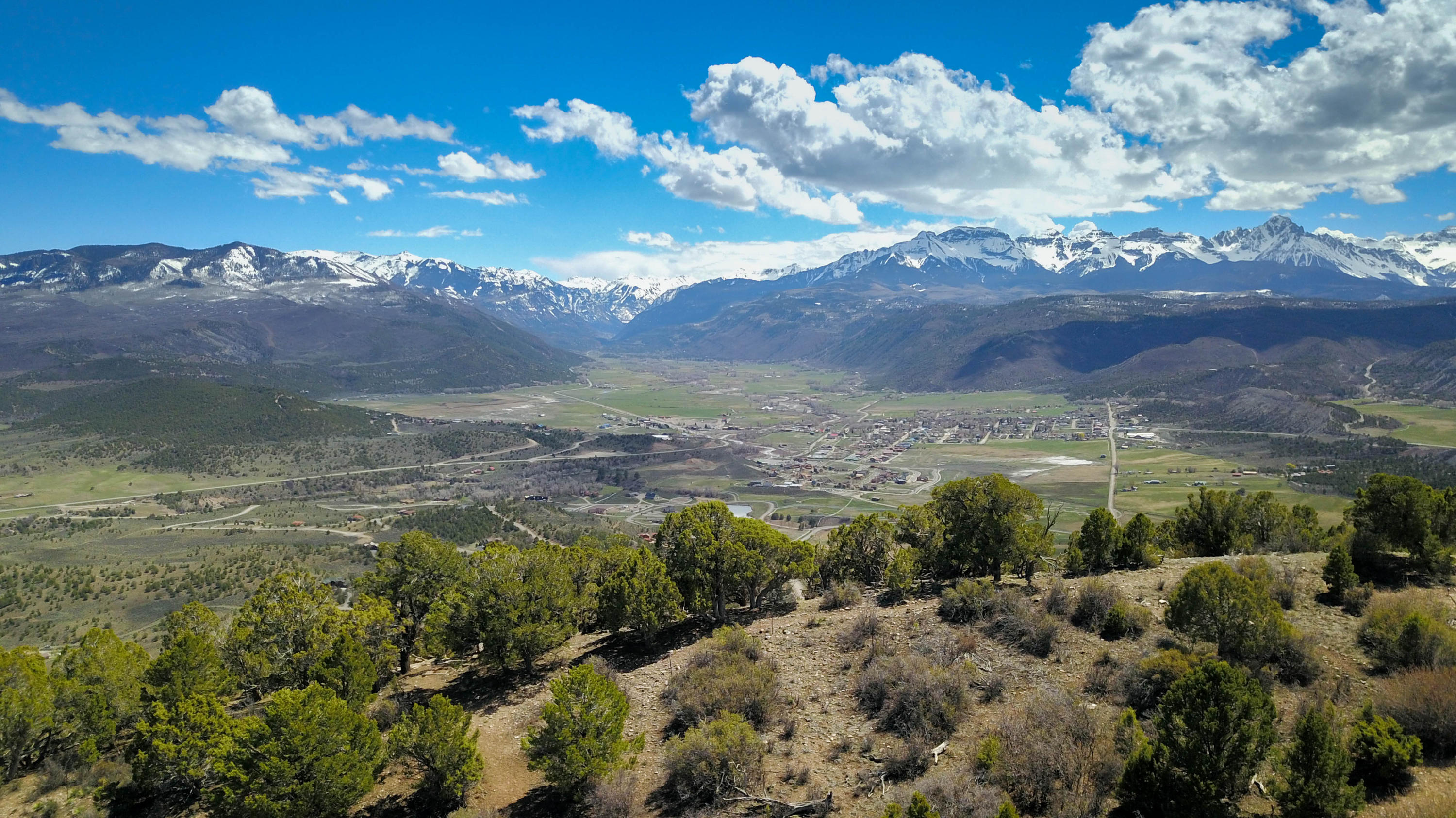 802 Pine Drive Ridgway, CO 81432 - Photo 5 of 10 a view of a lake with mountains in the background
