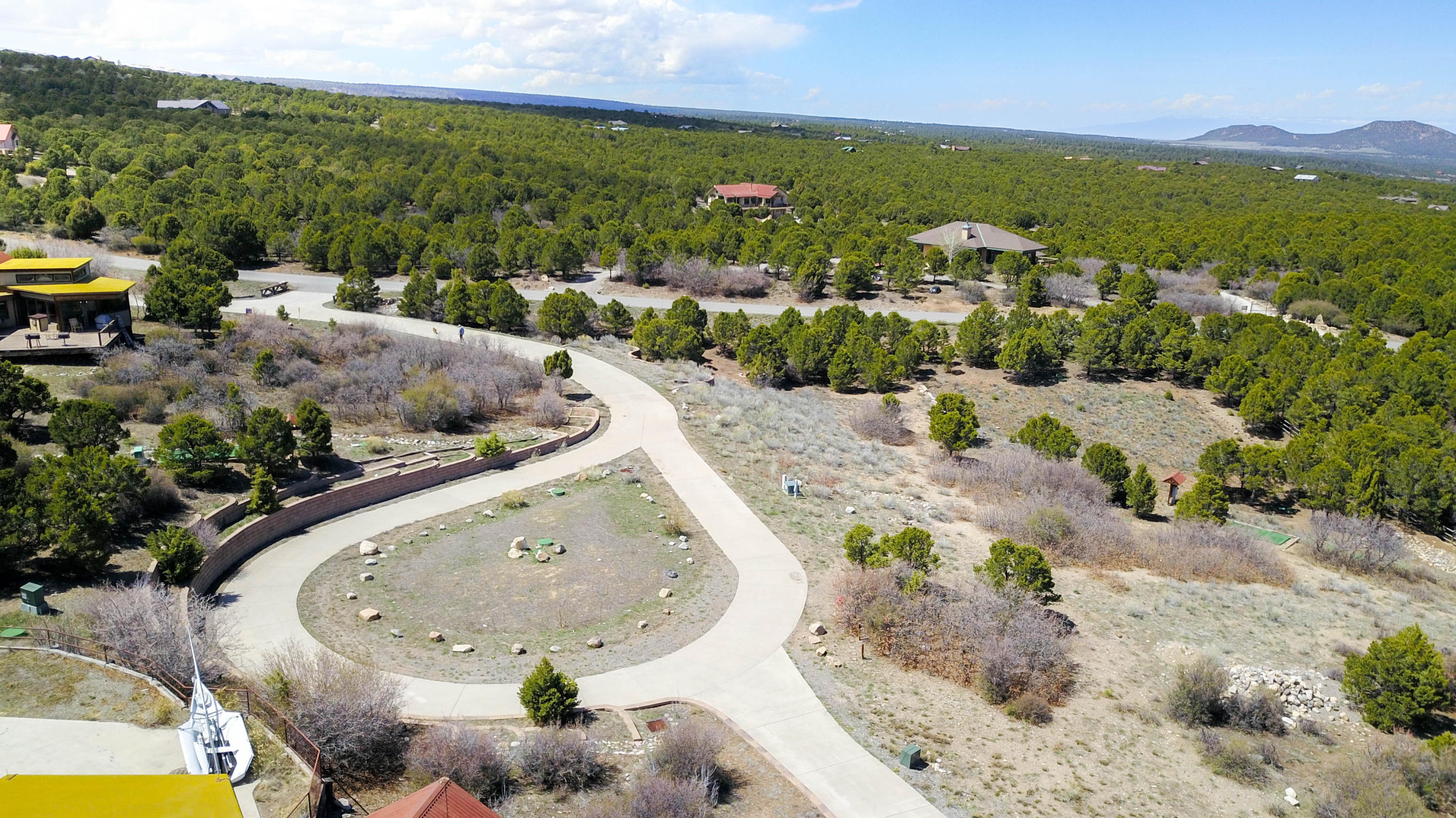 802 Pine Drive Ridgway, CO 81432 - Photo 10 of 10 a view of a swimming pool with a table and chairs
