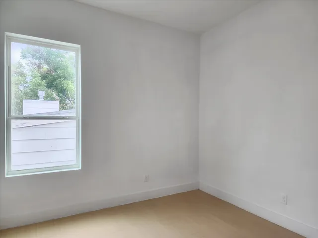 a bathroom with a tub and a sink