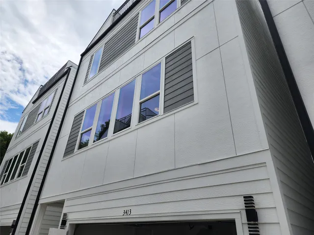 a view of a backyard of the house