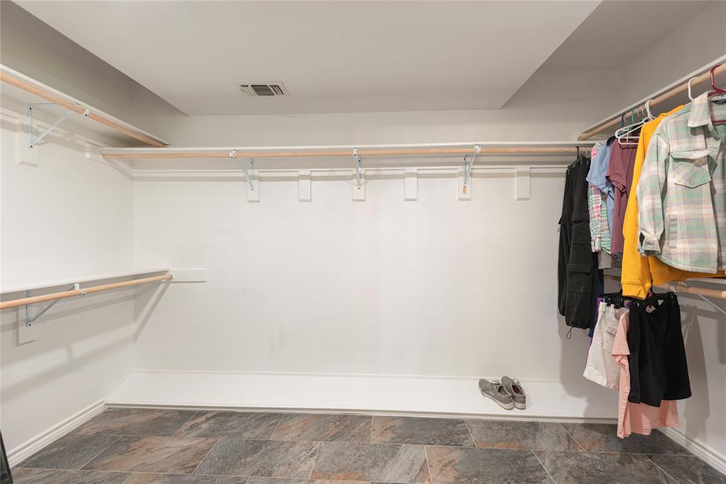 2020 Arbor Bend Road Bonham, TX 75418 - Photo 23 of 40 Walk in closet with stone finish floors