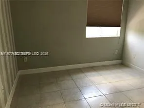 a view of a utility room with a window