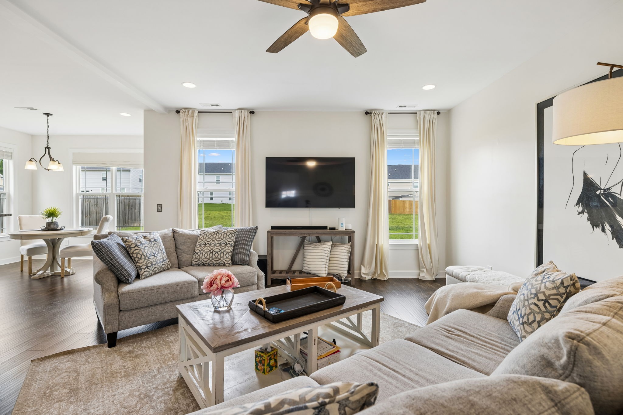 1002 Garrison Way Spring Hill, TN 37174 - Photo 13 of 63 a living room with furniture and a flat screen tv