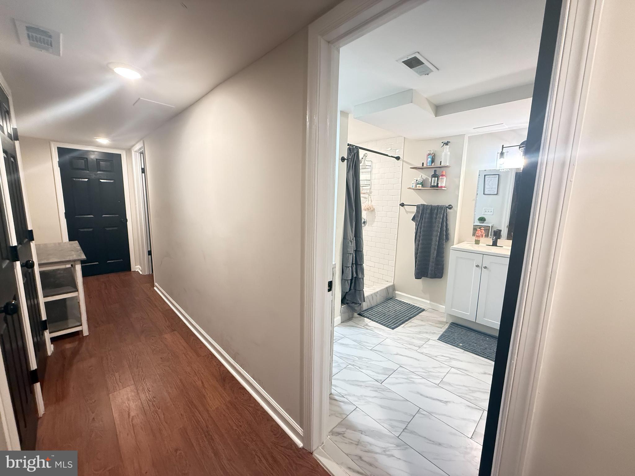 77 Martin Road Conowingo, MD 21918 - Photo 14 of 24 a view of a hallway with wooden floor and cabinets