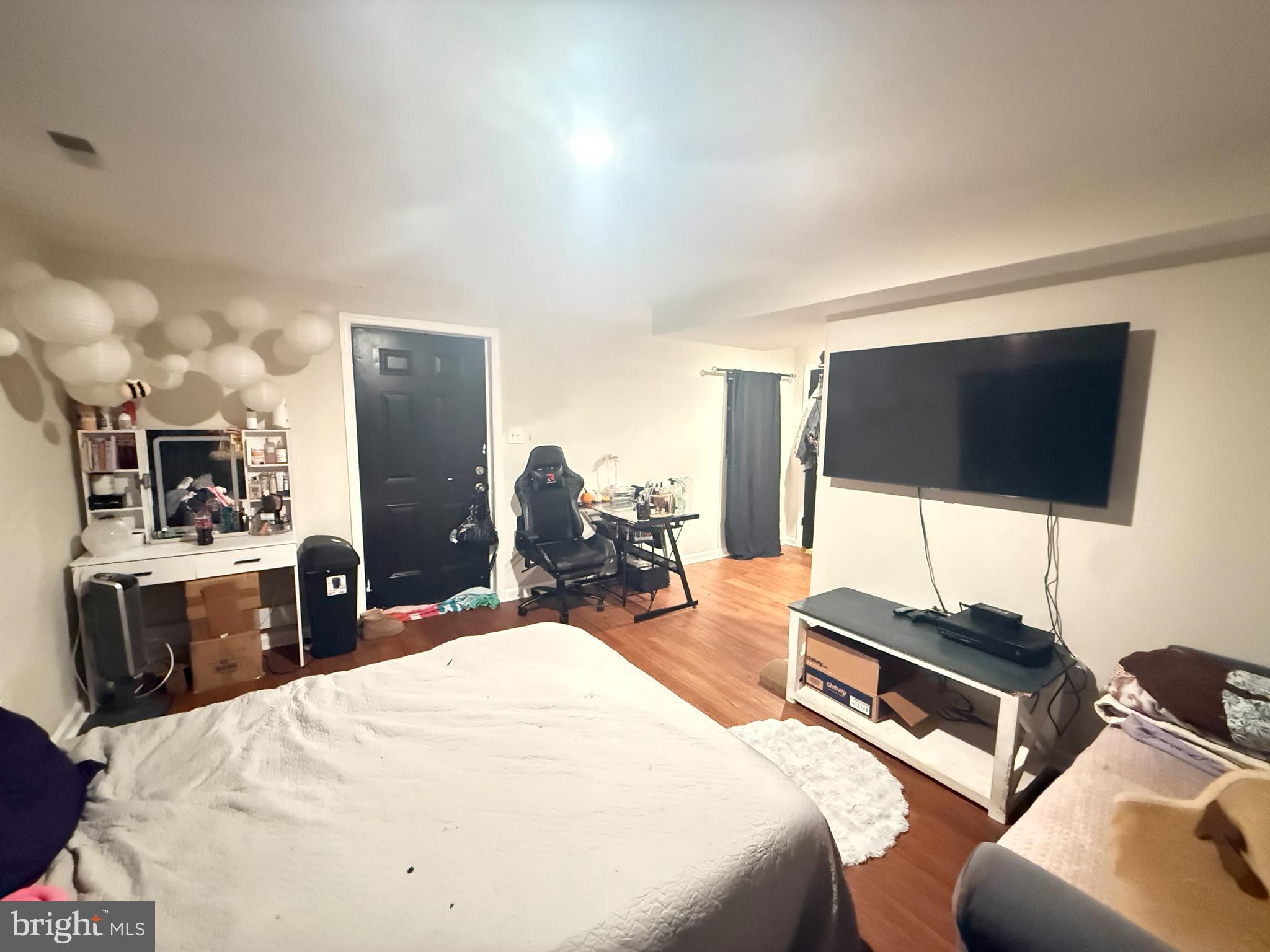 77 Martin Road Conowingo, MD 21918 - Photo 20 of 24 a room with a bed and a flat screen tv